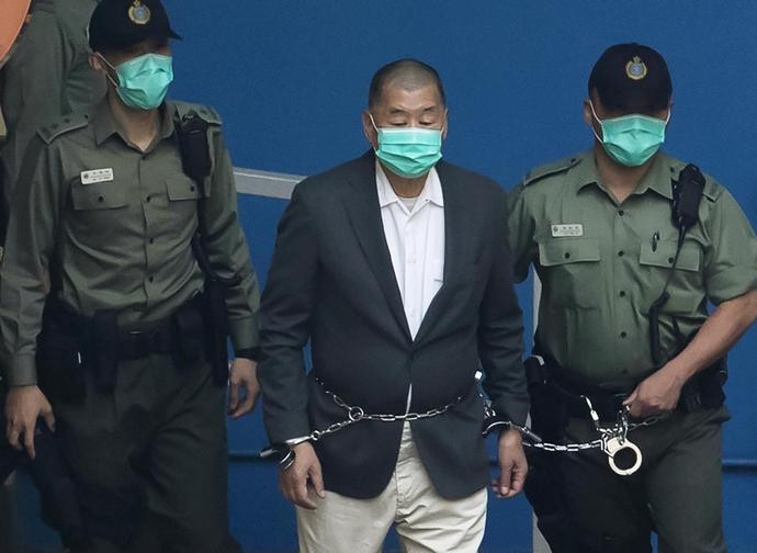 Jimmy Lai taken to court Jimmy Lai taken to court